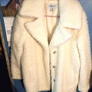 Celebrity pink XL white fur coat.